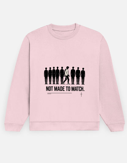 Front view of the light baby pink MATCH unisex sweatshirt